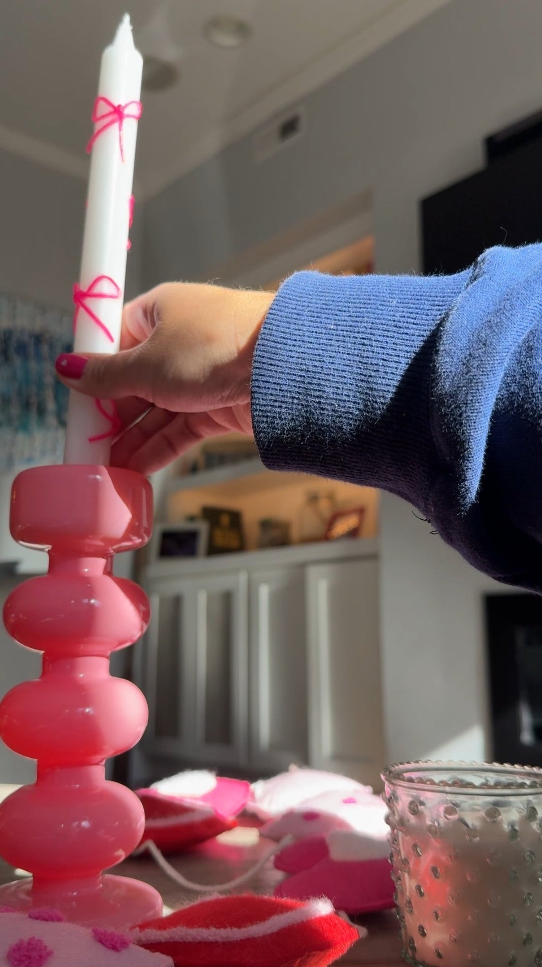 Candles with pink bows using wikki stix for Valentine’s Day